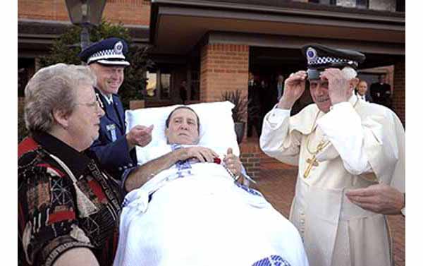 Benedict XVI wearing Police Hat